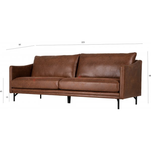 3-sitssoffa i cognacsf�rgat ecol�der | Gener�s komfort, tidl�s design & svarta metallben | Harpan